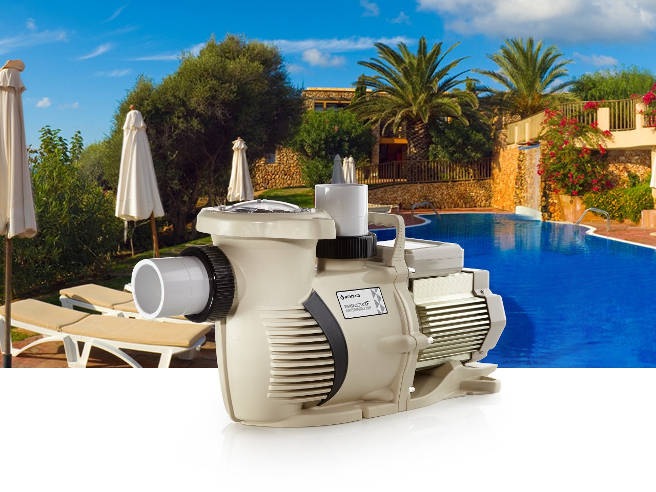 A WhisperfloXF pool pump overlay on a pool pad with beach chairs. 